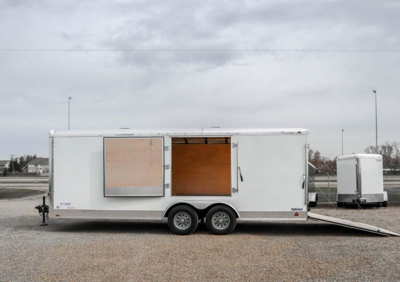*Clearout Price- SAVE $2,000!* 2023 Continental Cargo Tailwind 8.5' x 20' (White, 5K Axles, Ramp Door) Car Hauler
